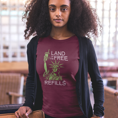 Woman wearing a maroon t-shirt with a design that says Land of the Free Refills.